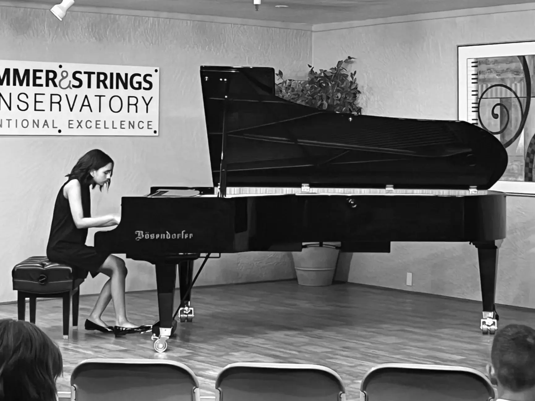 Student performing solo at scholarship showcase
